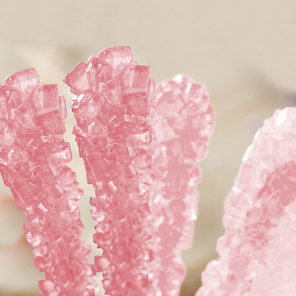 Espeez pink cherry rock candy sticks, perfect for a colorful party table.