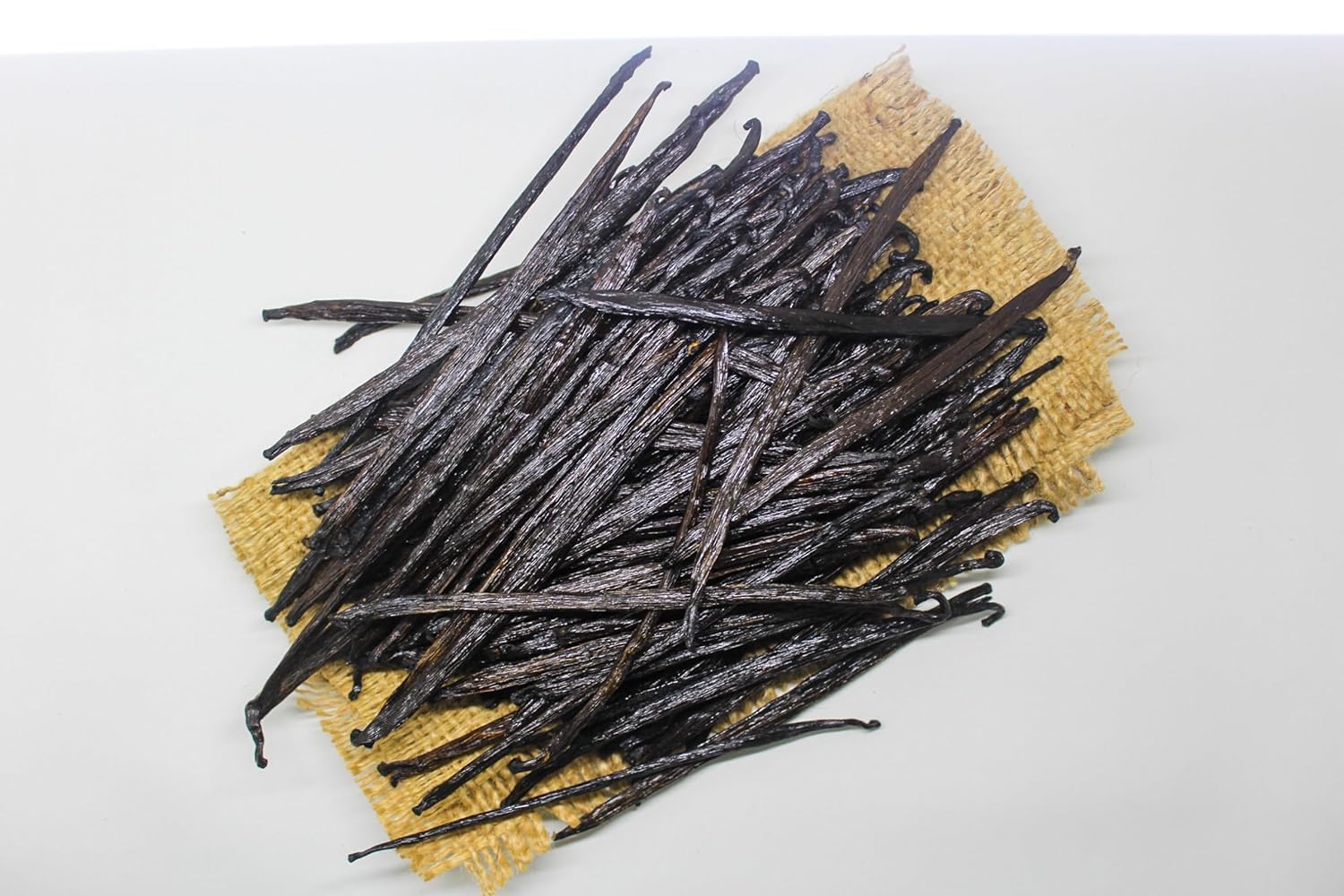 ESSENCE Food & Beverage Papua Indonesia vanilla beans sun-dried for rich aroma in desserts.