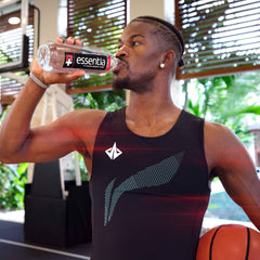 Essentia Water bottle pour shot showing smooth flow and refreshment