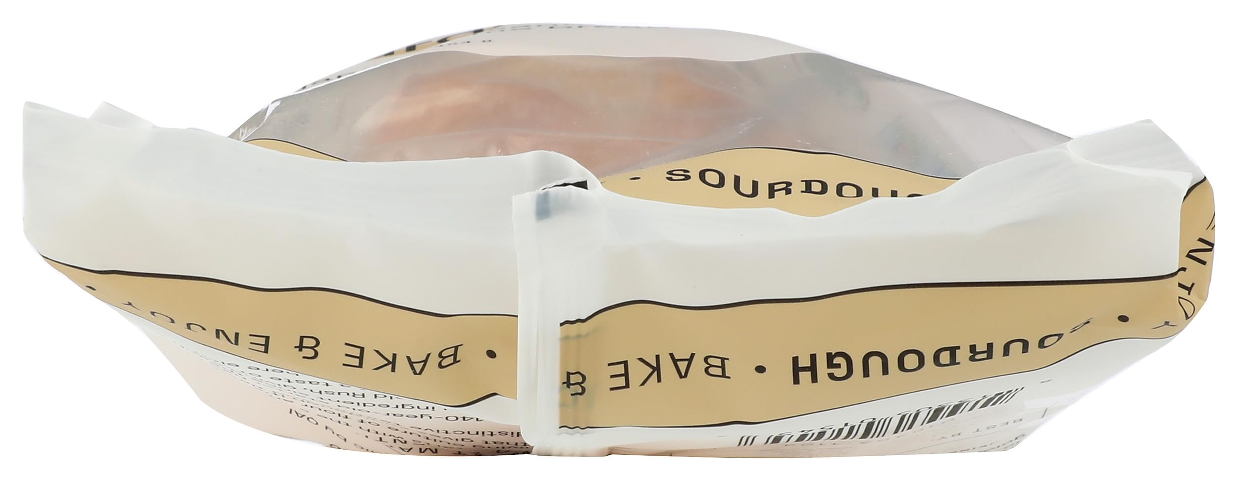 Essential Baking Company sourdough dough scored before bake showcasing artisan crumb.
