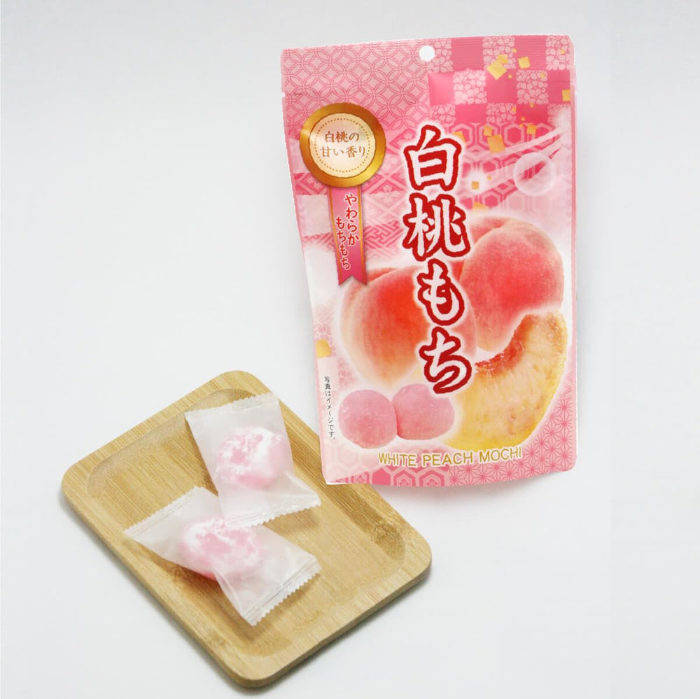Estala Mochi White Peach serving shot suggests shareable snack for tea time or gatherings.
