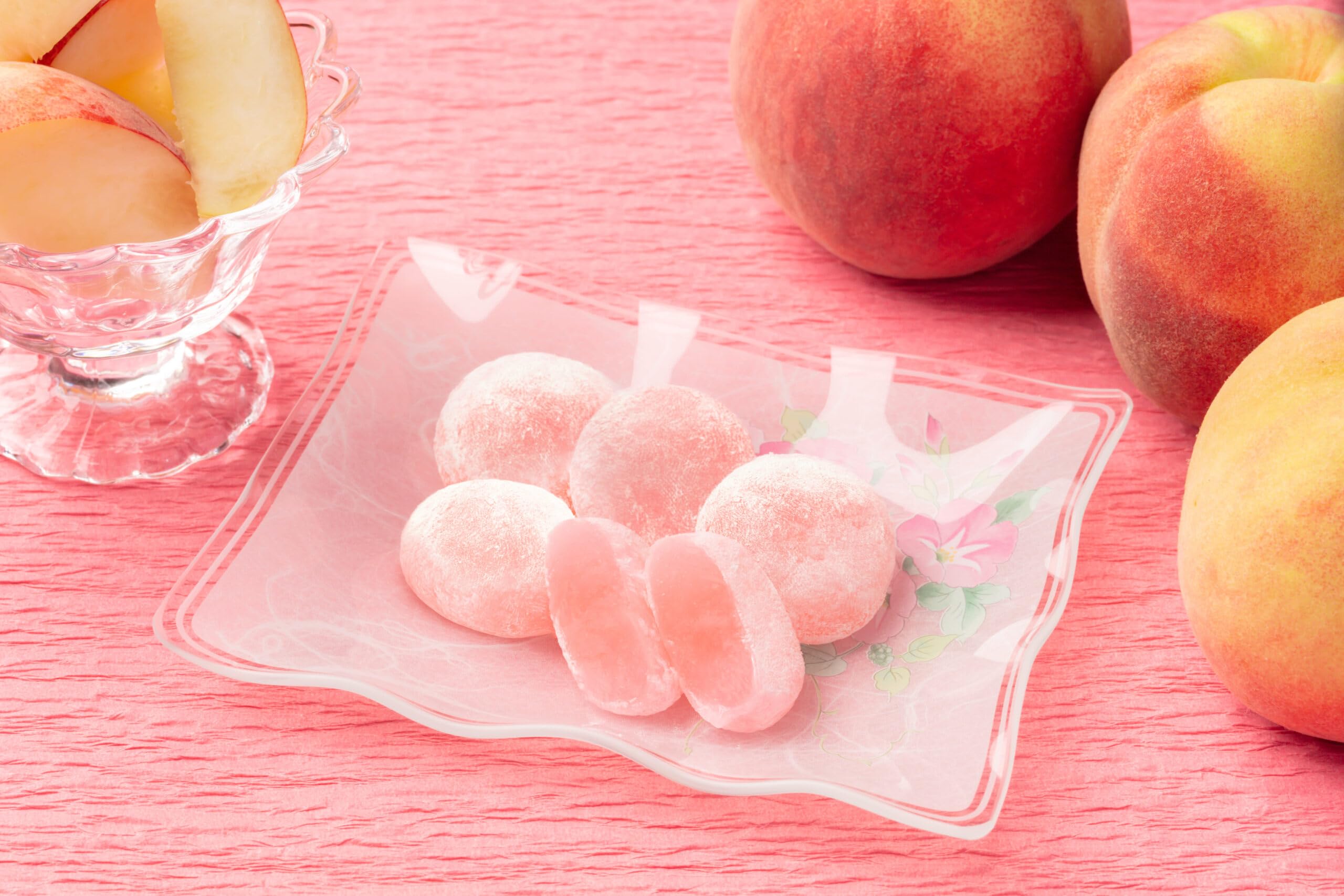 Estala Mochi White Peach texture closeup shows soft, chewy bite perfect for a dessert moment.