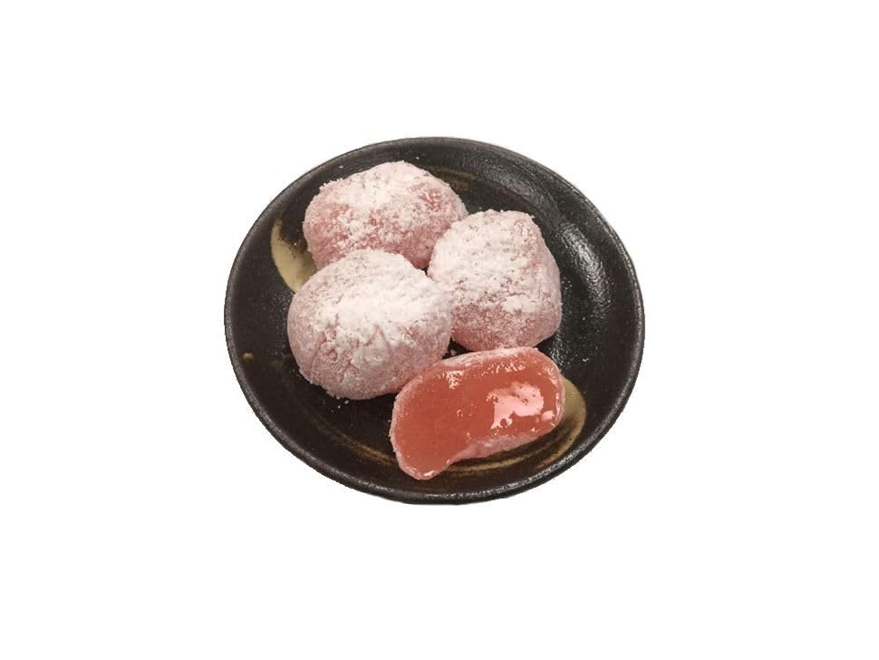 Estala Mochi White Peach wagashi tradition display emphasizes cultural heritage and refined flavor.