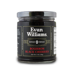 Evan Williams Bourbon Black Cherries stemmed jar: gourmet garnish for classy Old Fashioned cocktails.