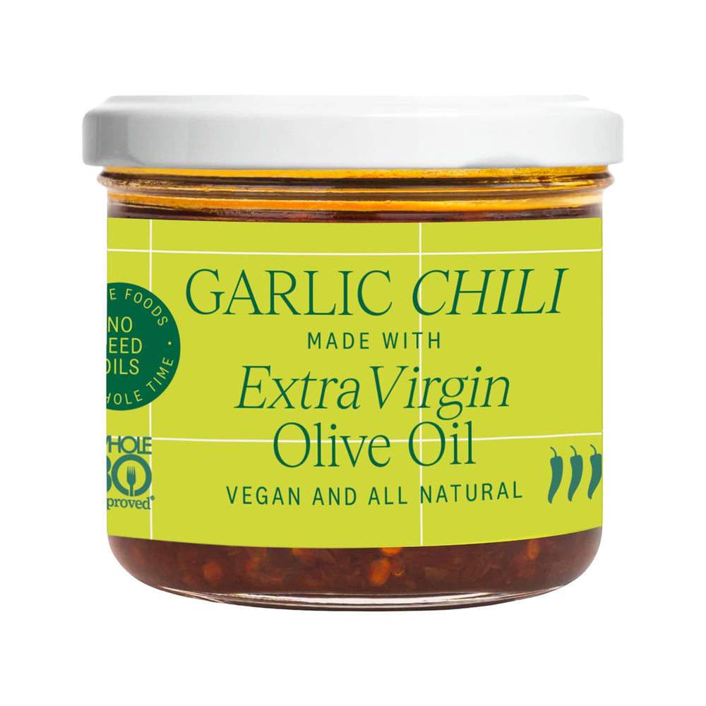 Everiday Garlic Chili Oil bottle pour adds rich garlic heat to stir-fries