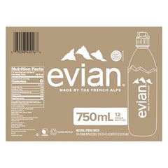 evian bottle poured into a glass showing a clean, refreshing taste