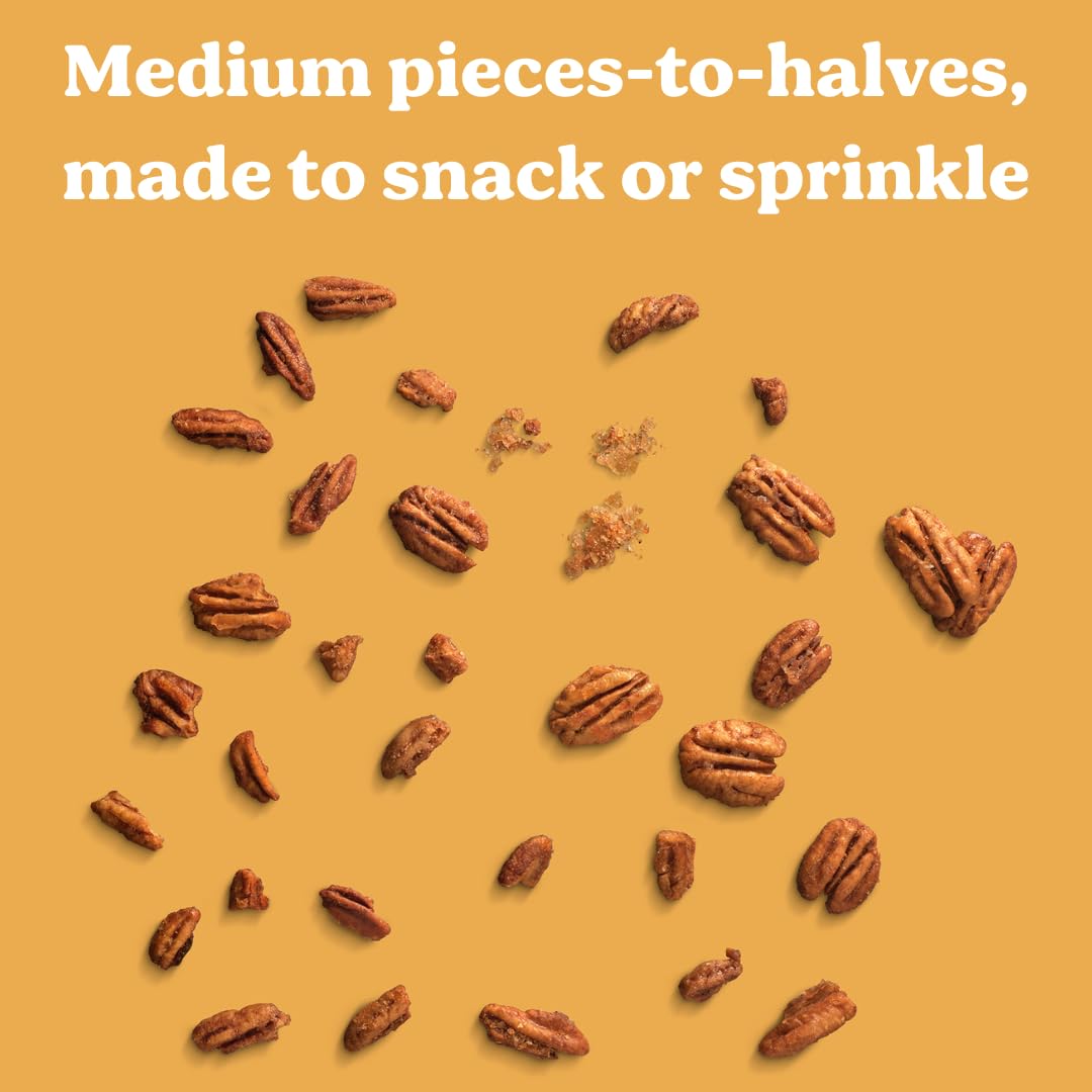 Evie's Pecans four-flavor tin opened with labels for sharing.