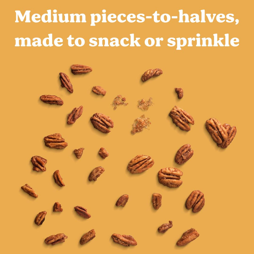 Evie's Pecans four-flavor tin opened with labels for sharing.
