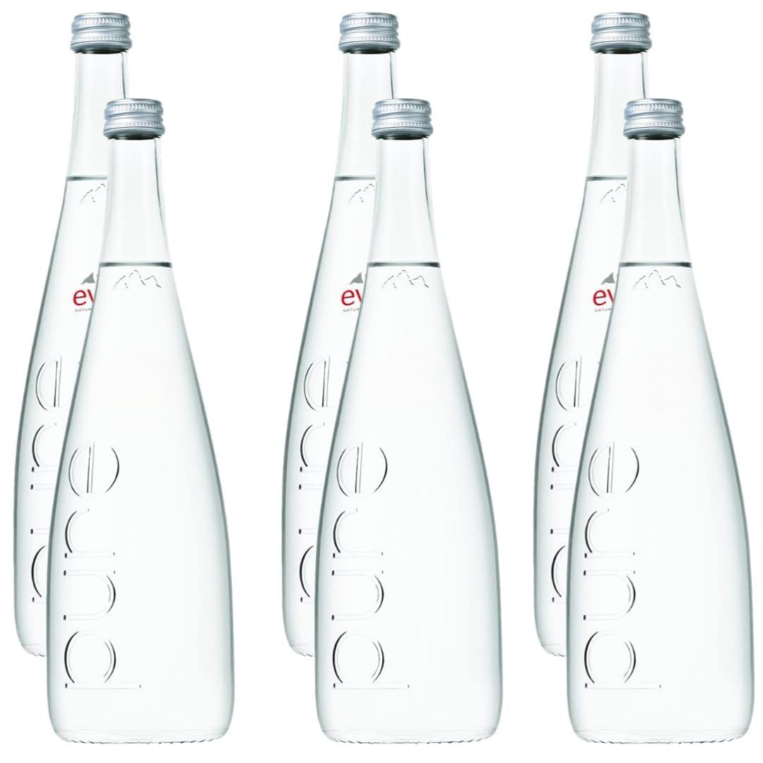 Eviian natural mineral water in a glass bottle elevates table setting and refreshment