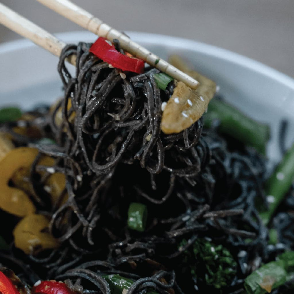EXPLORE CUISINE Prepared pasta bowl with veggies, simple weeknight dinner.