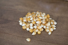 Close-up of extra-large caramel kernels ready for gourmet popcorn