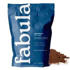 Fabula Dark Roast coffee bag front shows organic, fresh-roasted beans.