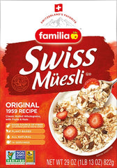 Pouring milk over Familia Swiss Muesli for a quick, satisfying start.