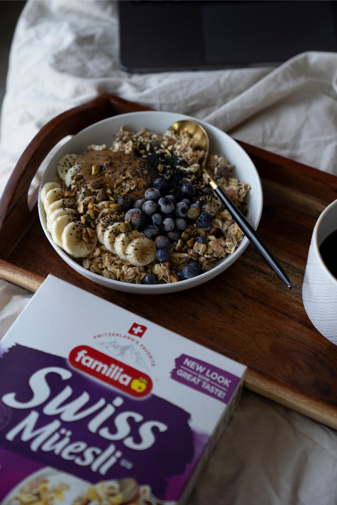 Familia Swiss Muesli ready-to-eat serving with fruit and yogurt.