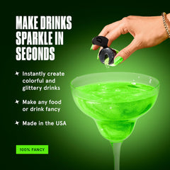 Fancy Sprinkles Glow Worm Green glitter in a drink setup glows under black light.