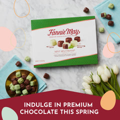 Close-up of Mint Meltaways gift box showcasing mint centers and chocolate coating.