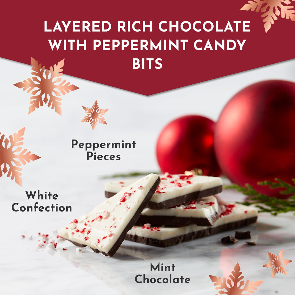 Festive Fannie May Peppermint Bark gift tin on a table ready to gift