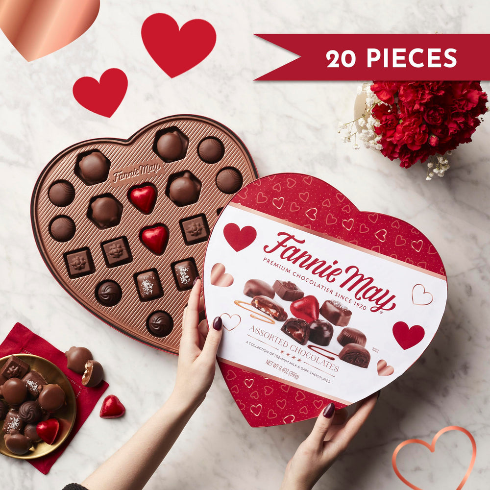 Fannie May white pretzel clusters with chocolate for a crunchy, indulgent bite.
