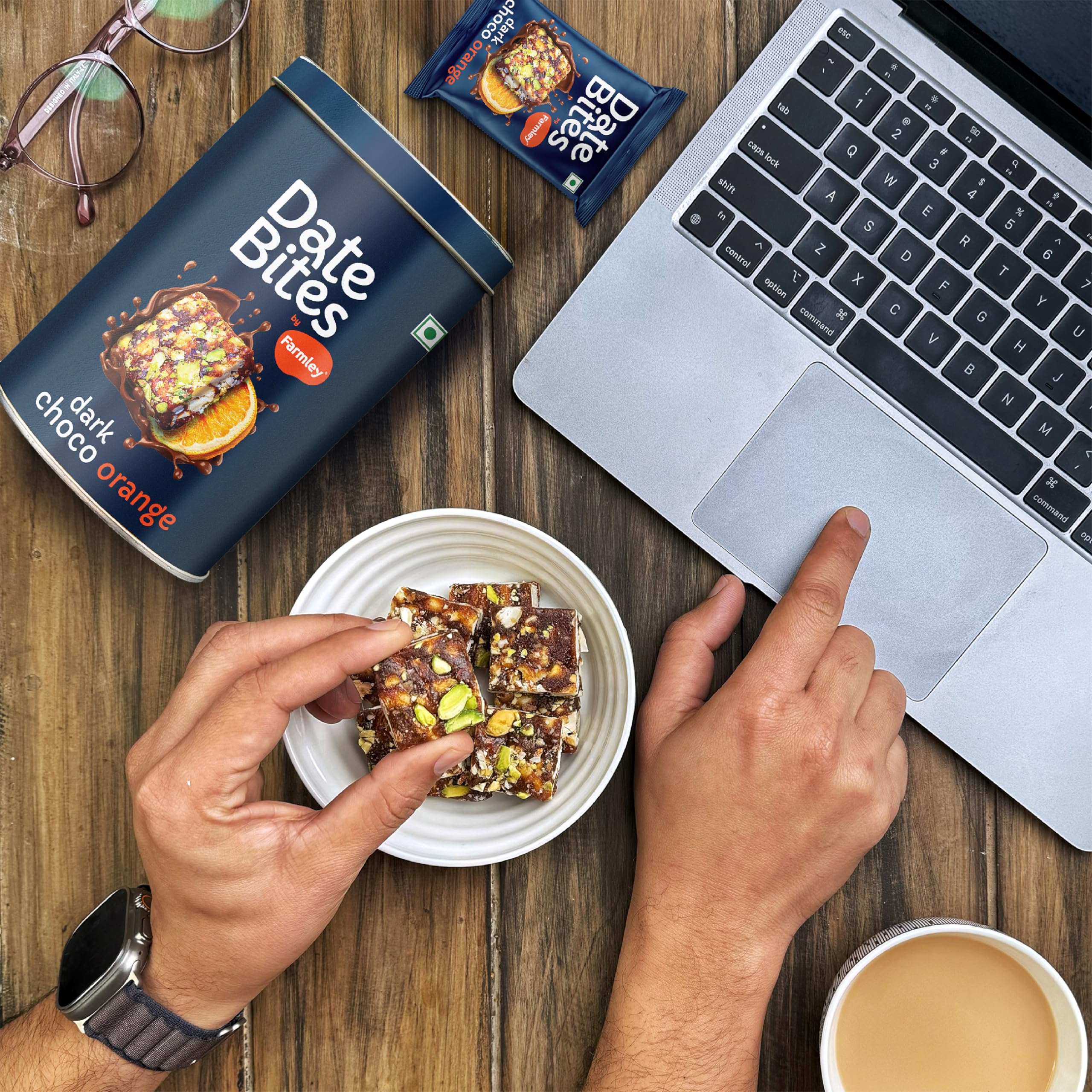 Farmley dates bar dark choco orange packaged snack scene emphasizing sustainability