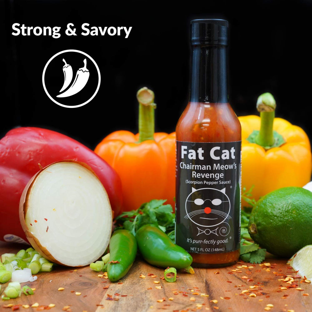 Fat Cat Chairman Meow's Revenge bottle on table signals gourmet heat