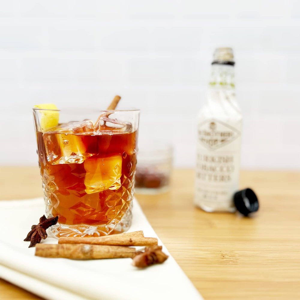 Close-up of Fee Brothers Aztec Chocolate Bitters drops with rich aroma