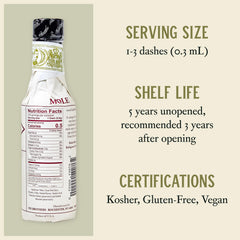 Fee Brothers Mole Bitters being poured into a glass to add depth and balance.