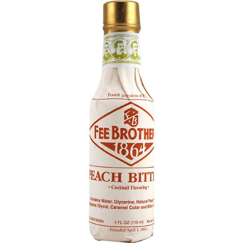Finished peach cocktail with Fee Brothers bitters, inviting aroma and balanced finish.