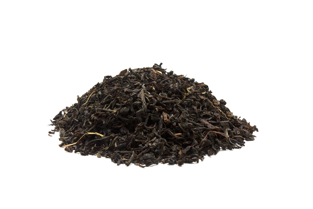 Fermentaholics Assam Black Tea hot brew steaming in a mug
