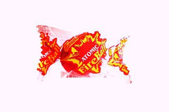 Ferrara Atomic FireBall jawbreakers, round shape ideal for sharing at parties and game nights.