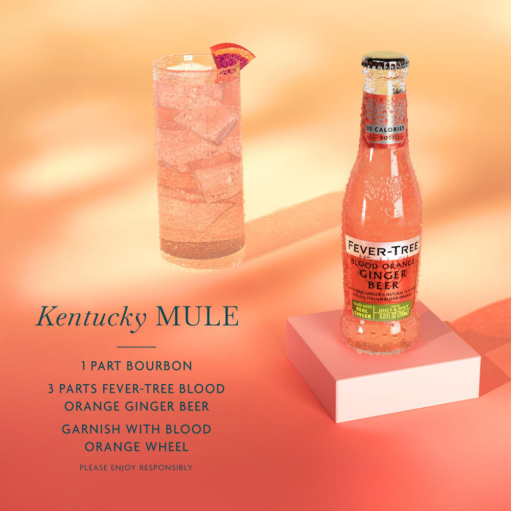 Fever-Tree Blood Orange Ginger Beer bottle near a cocktail station—versatile mixer.