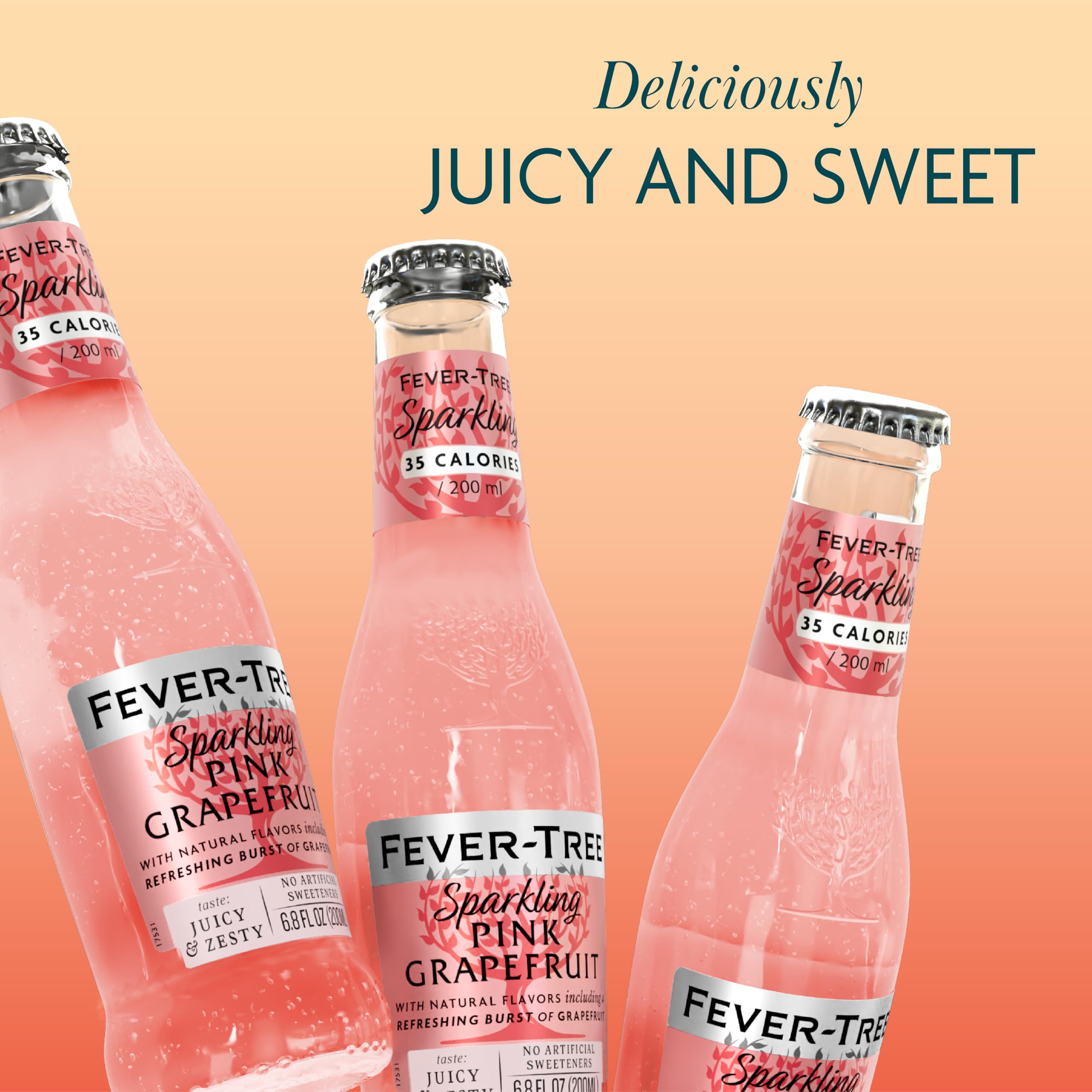 Bubbles rising in Fever-Tree Sparkling Pink Grapefruit in a glass.