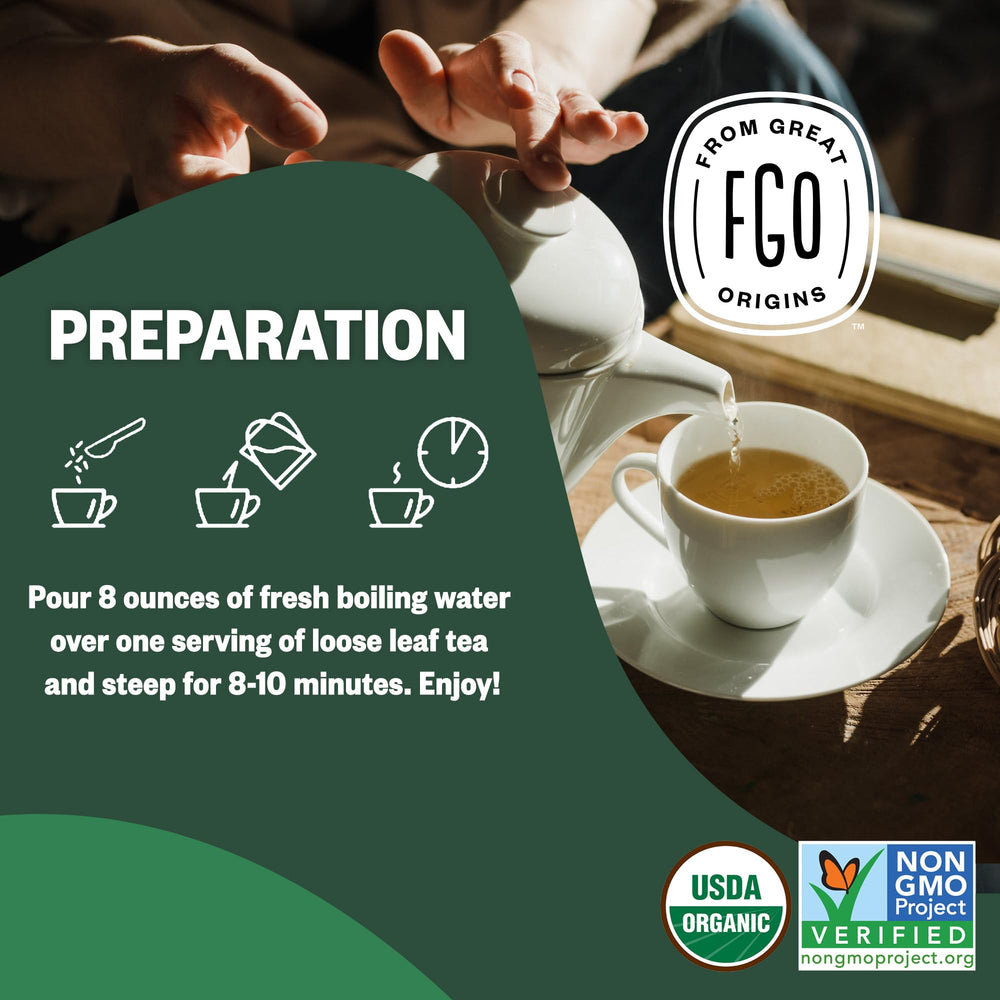 FGO nettle tea cup steaming with light green infusion.