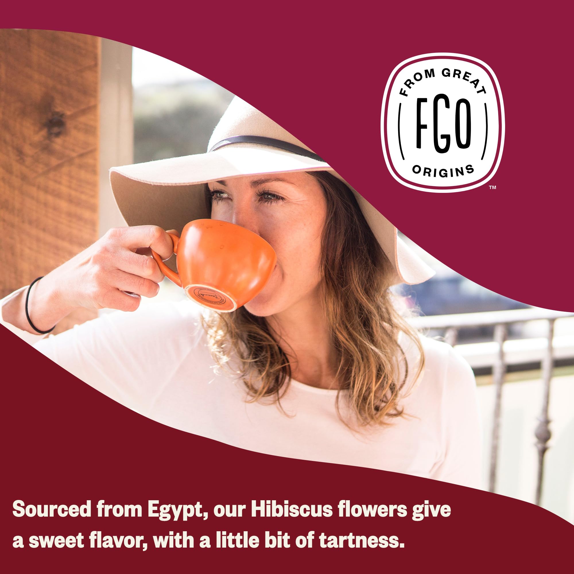 FGO Organic hibiscus infusion in glass, deep ruby-red color