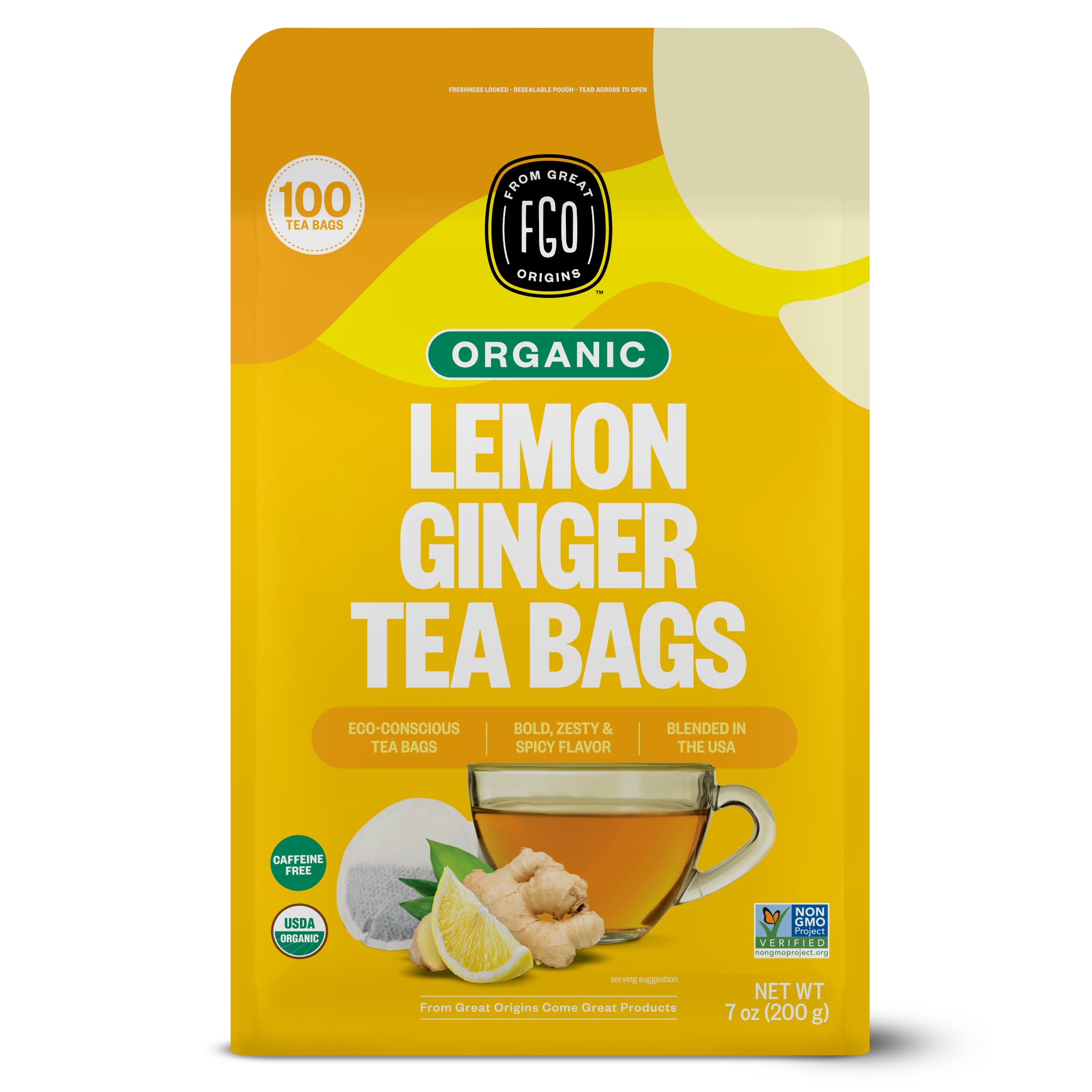 FGO Organic Lemon Ginger Tea bags close-up, vibrant lemon zest aroma for a comforting cup.