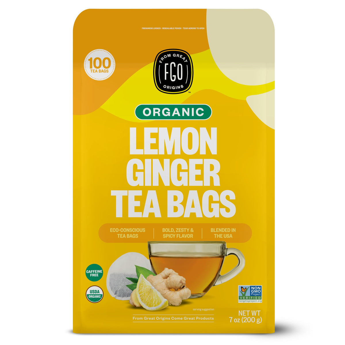 FGO Organic Lemon Ginger Tea bags close-up, vibrant lemon zest aroma for a comforting cup.