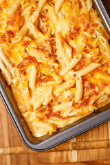 Cooked Fiber Gourmet Light Penne plated with tomato sauce, ready for a quick dinner.