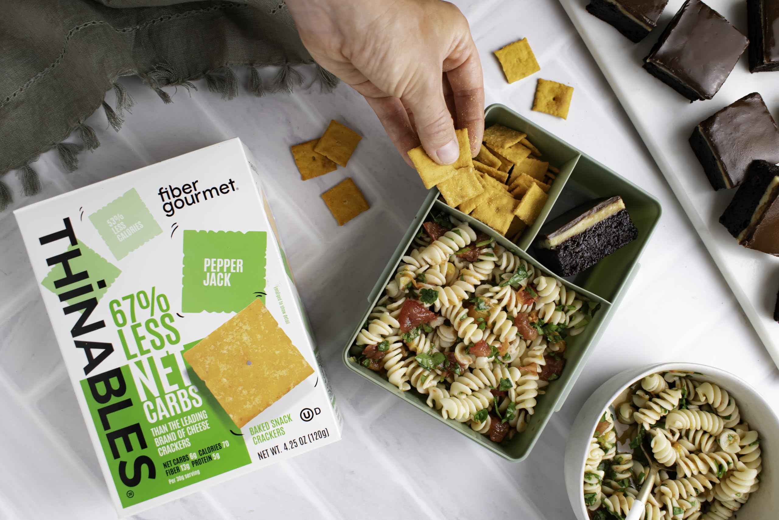 Crackers with dip featuring Fiber Gourmet Pepper Jack Thinables.