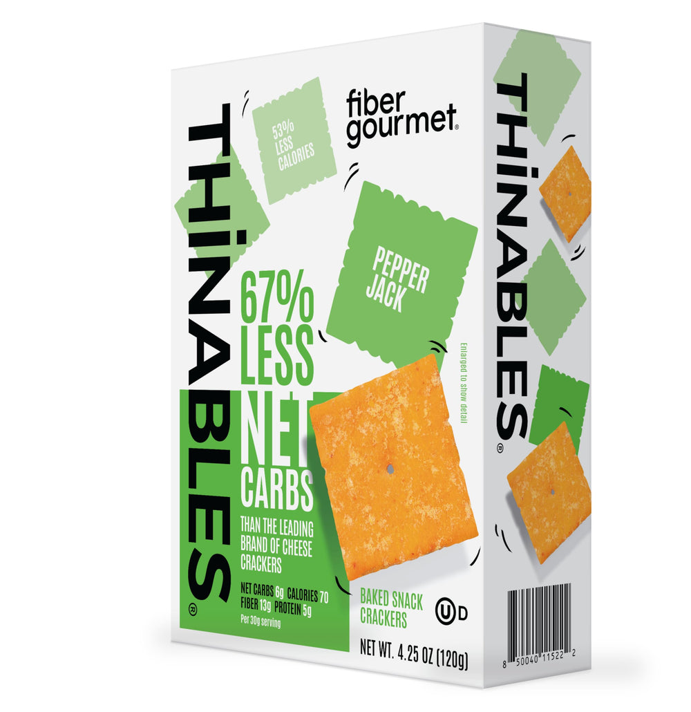 Fiber Gourmet Pepper Jack Thinables crackers pack on wood, keto-friendly snack.