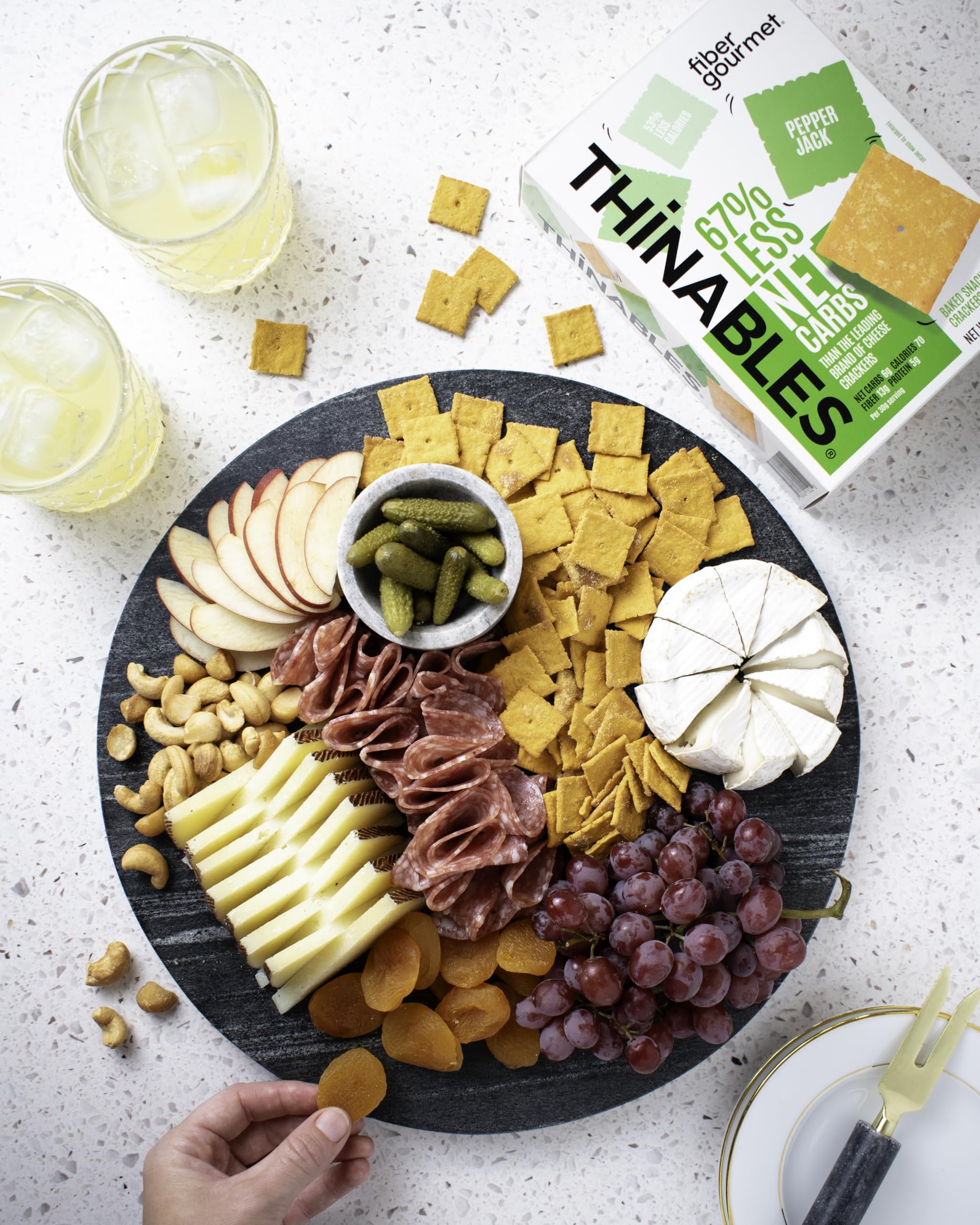 Kosher certification seal beside Fiber Gourmet Pepper Jack Thinables label.