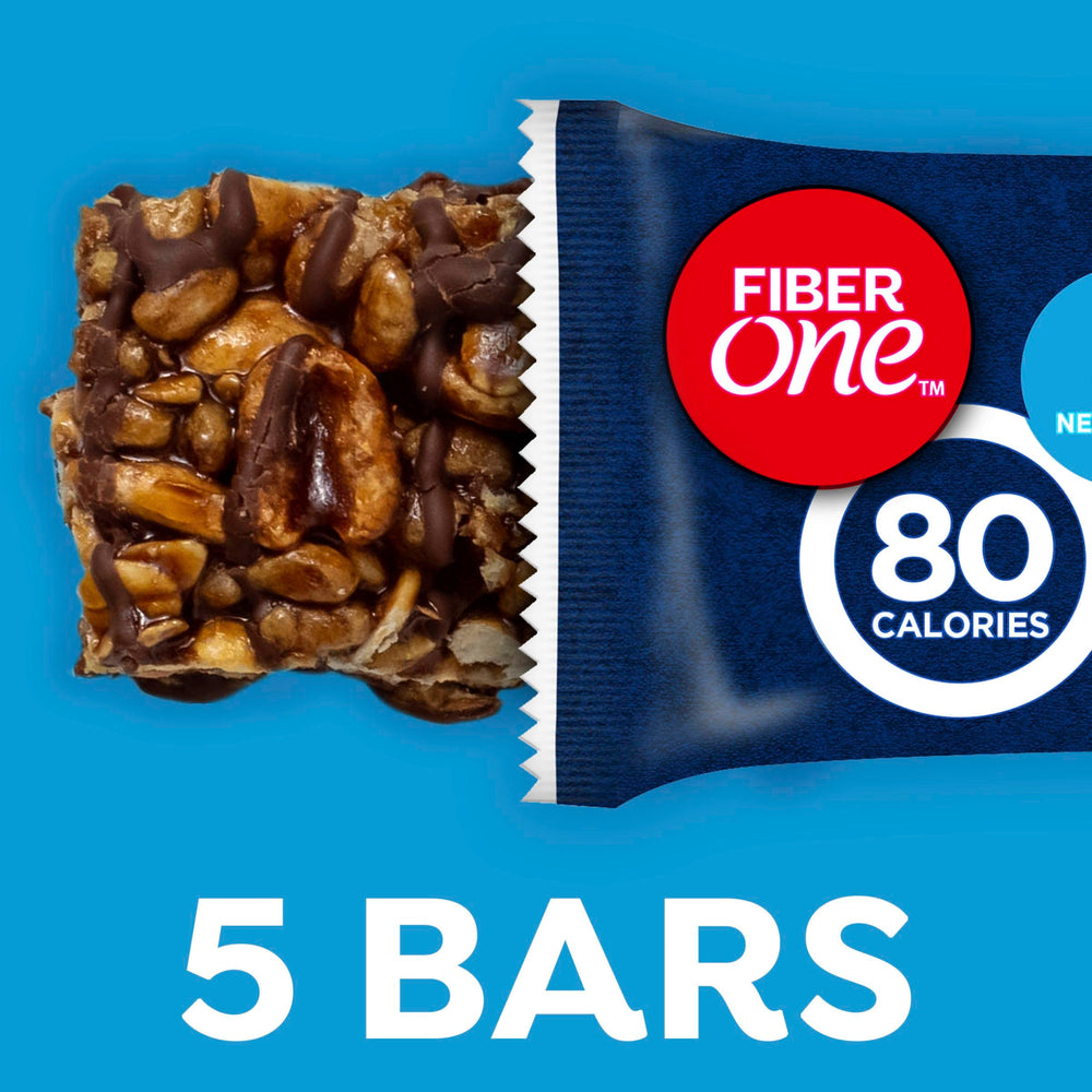 Fiber One 80-Calorie bars on office desk show quick morning snack.