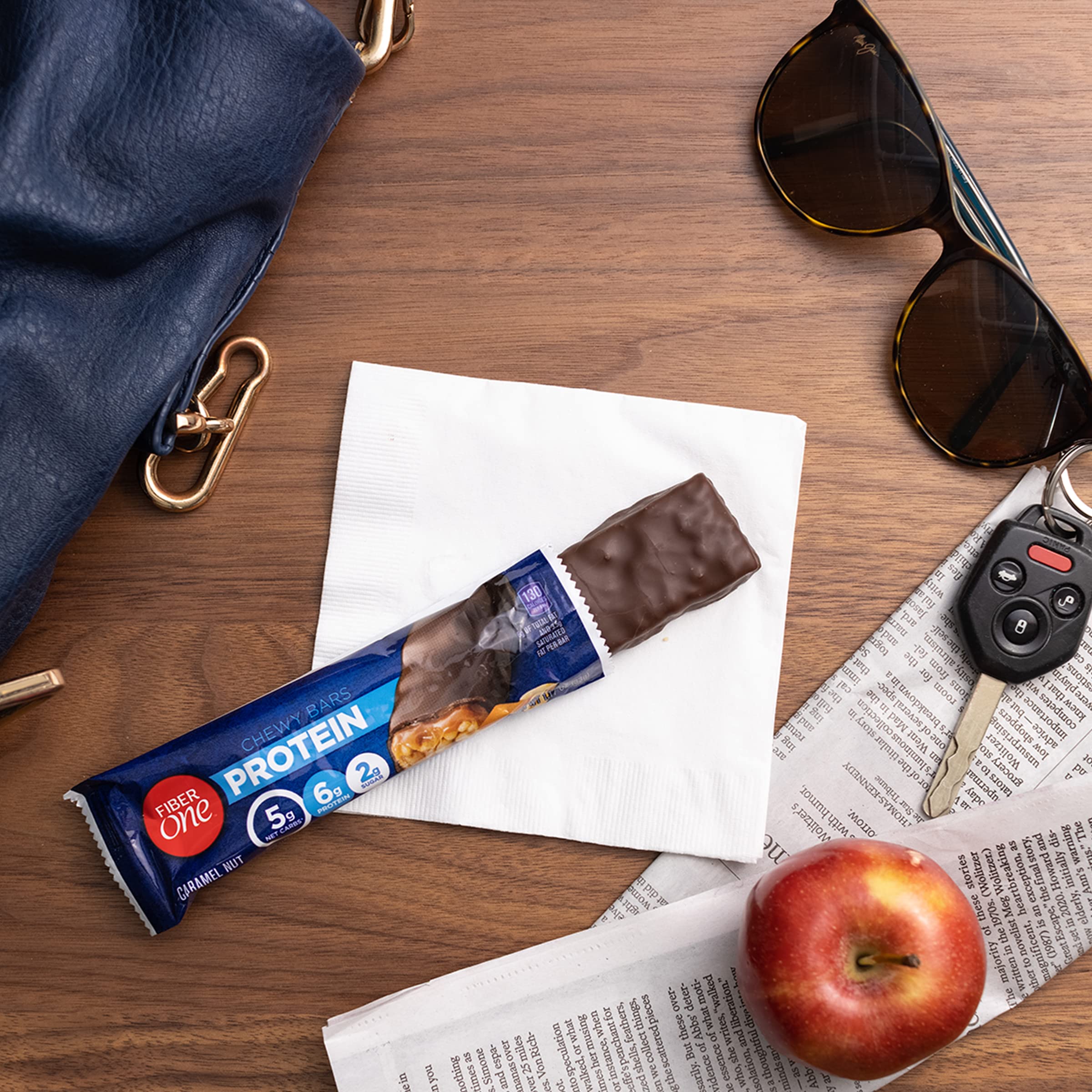 Fiber One Caramel Nut Bar with breakfast setup on the go