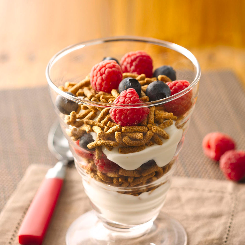 Fiber One Original Bran cereal with yogurt showcasing a crunchy, fiber-forward snack.