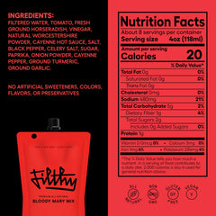 Filthy Bloody Mary Mix being poured into a glass for a brunch-ready cocktail