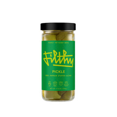 Filthy Food pickle-stuffed olives in a jar front view, premium cocktail garnish.