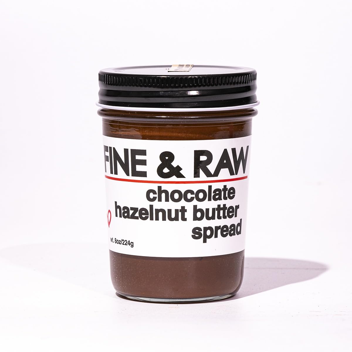 Fine & Raw Chocolate Hazelnut Butter Spread jar for toast and snacks.
