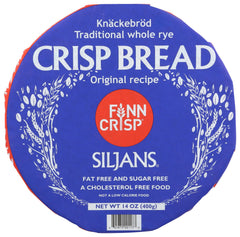 Finn Crisp Siljans Round Rye Crispbread wheel served with sardines on a plate.
