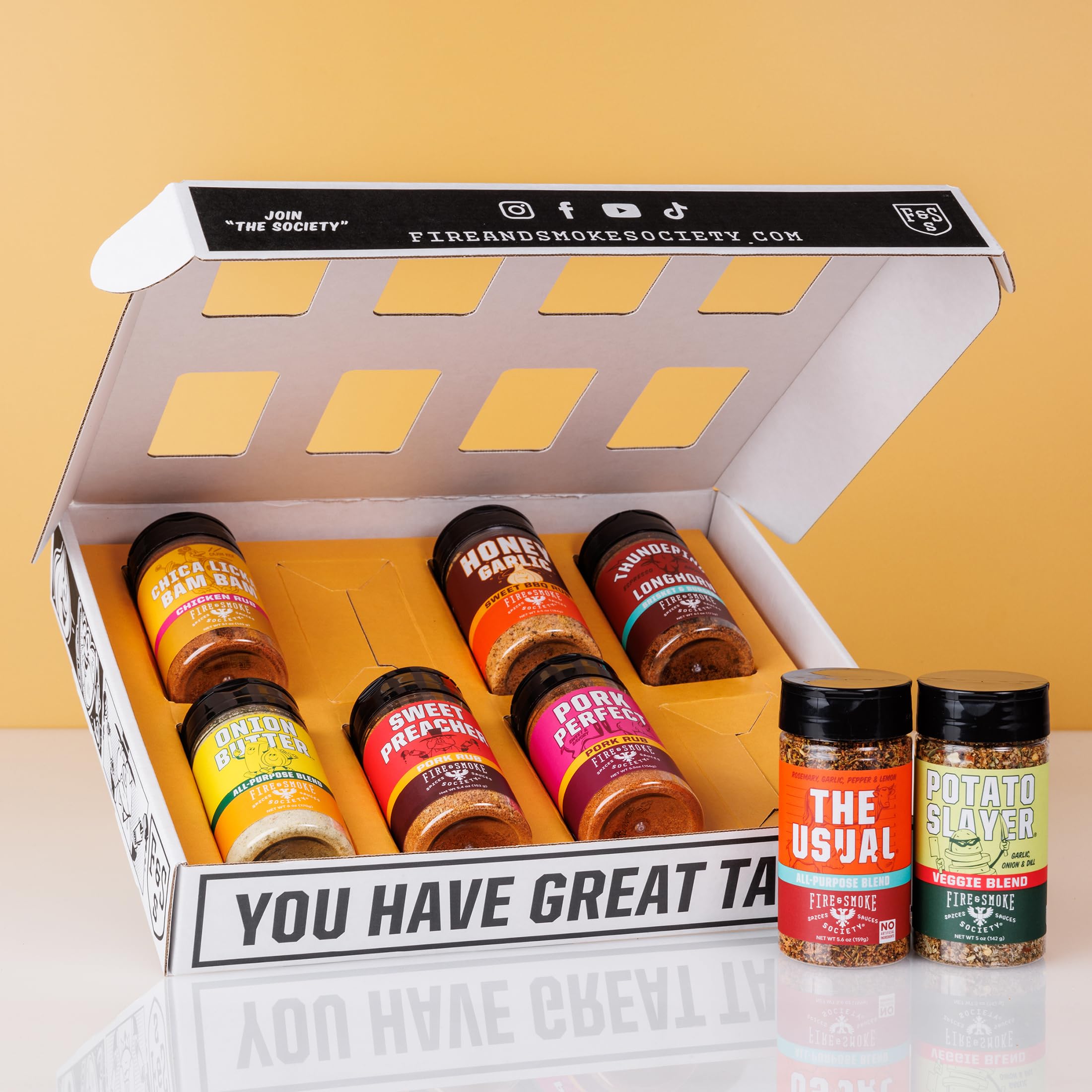 Fire & Smoke Society Honey Garlic bottle elevates chicken with sweet aroma.