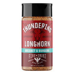 Fire and Smoke Society Thundering Longhorn steak seasoning bottle enhances beef flavor for grilling.