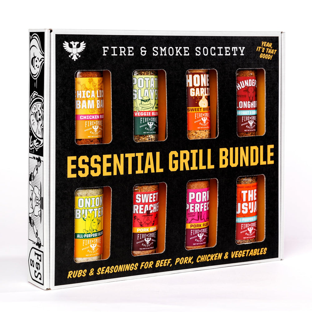 Fire & Smoke Society variety pack bottle pour for even grilling seasoning.