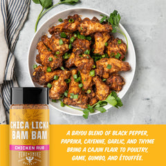 Chica Licka Bam Bam chicken wings being dusted with rub for BBQ